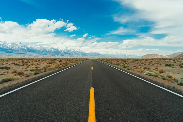Road with blue skies in background