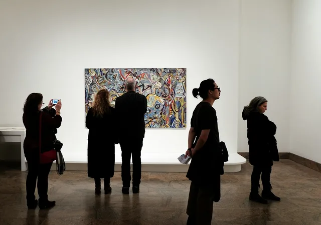 People looking at art in a gallery